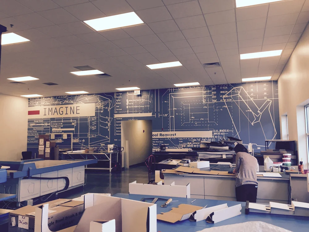 Commercial vinyl wallpaper installation in Boston office